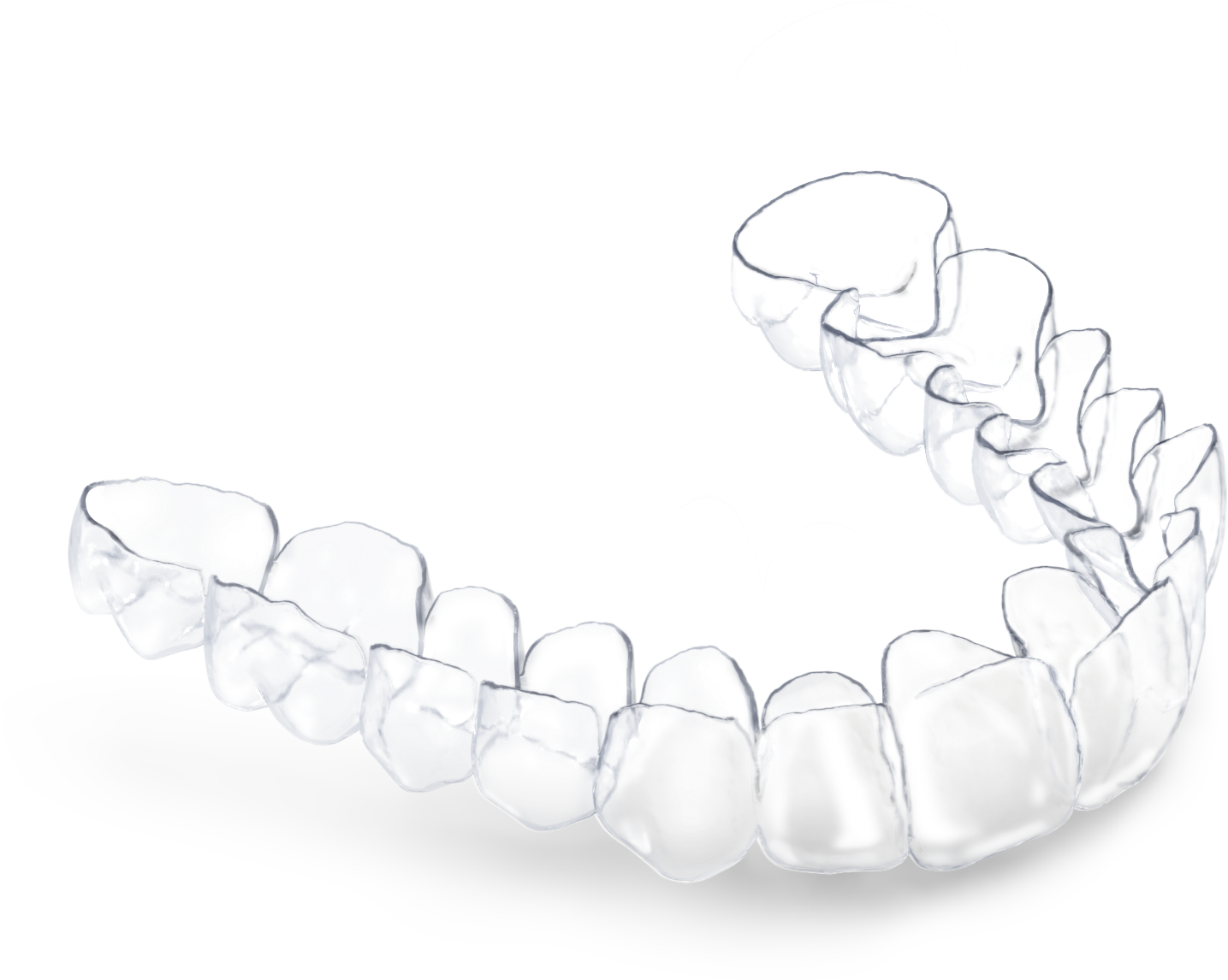 Clear invisible aligner tray held between fingers